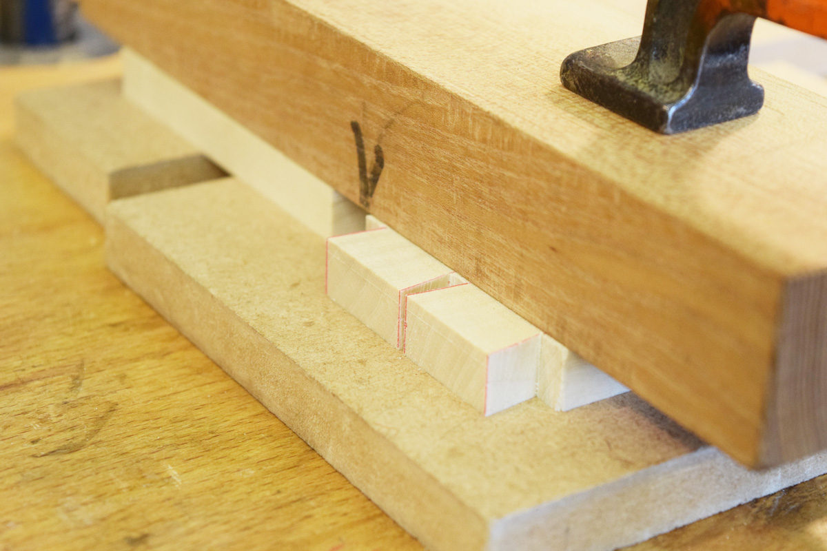 Clamping a block to chisel the shoulder line
