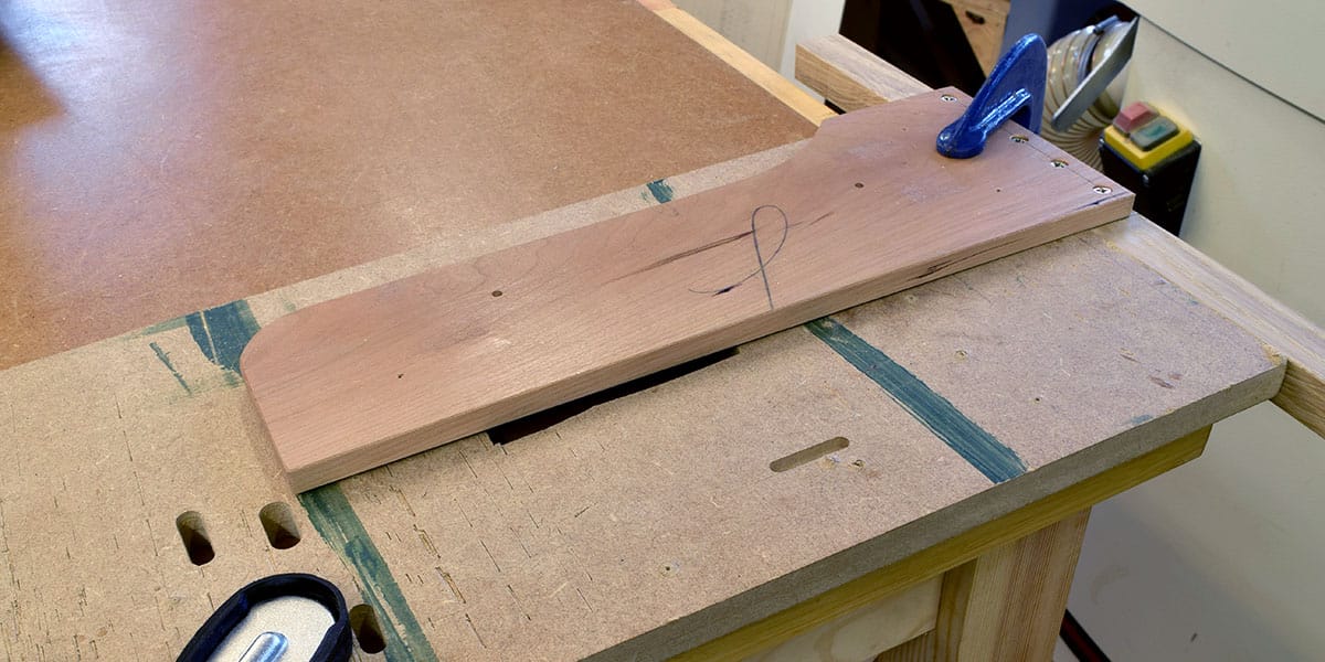 Clamp the crosscut ‘T’ square to a large piece of scrap material